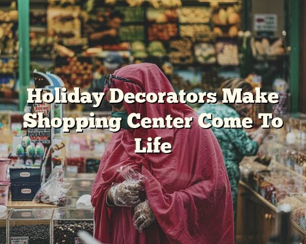 Holiday Decorators Make Shopping Center Come To Life